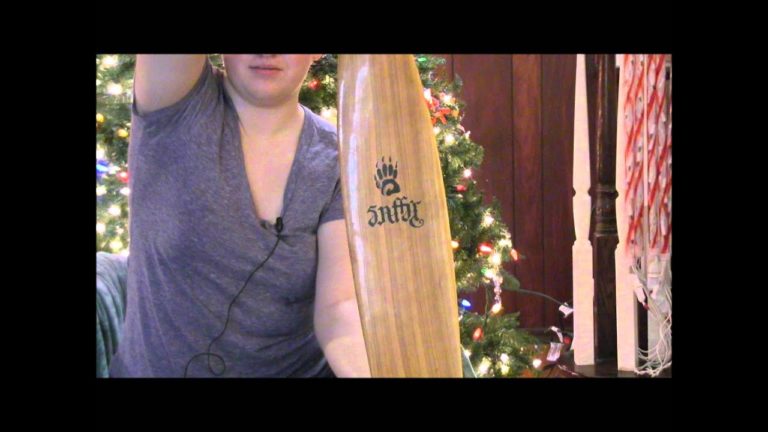 girl shows her new paddle