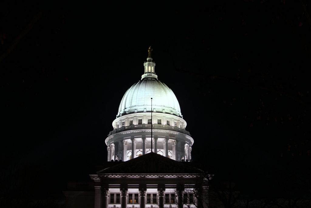 Lit up at night, the famous capitol building in downtown Madison is the center of a neat pedestrian-friendly street grid. 