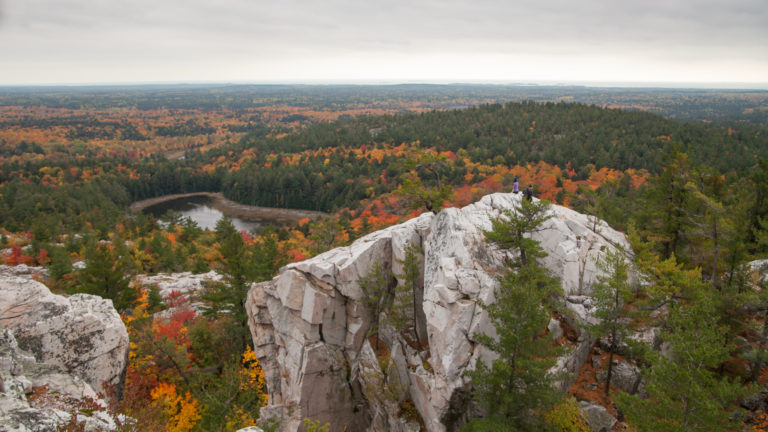 Fall view of a large rock, called "The Crack" in Killarney Provincial Park
