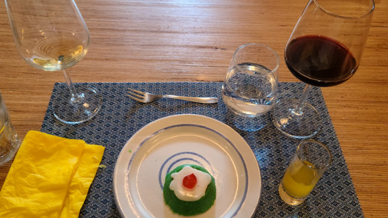 Cassata on a plate with wine