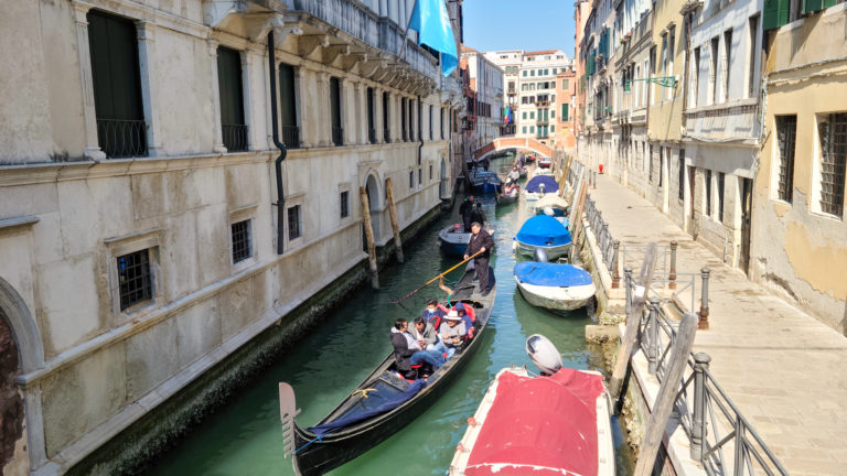 Canal crowded with gondolas, Venice, Italy