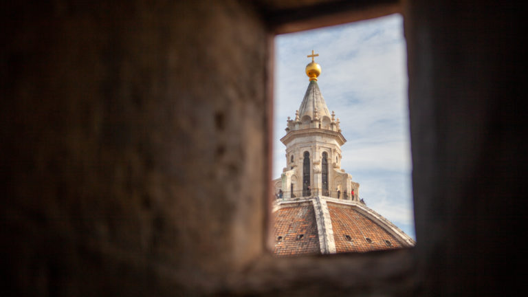 View of the Duomo from a small window of the Campanile di Giotto, Florence, Italy