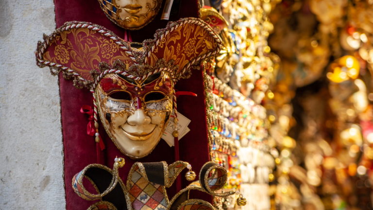 Elaborate masks in a shop window, Venice, Italy