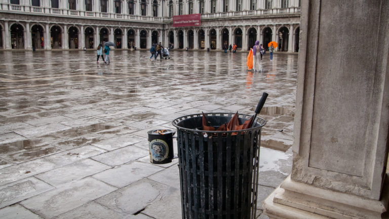 Umbrella in a garbage can, San Marco's Square, Venice, Italy