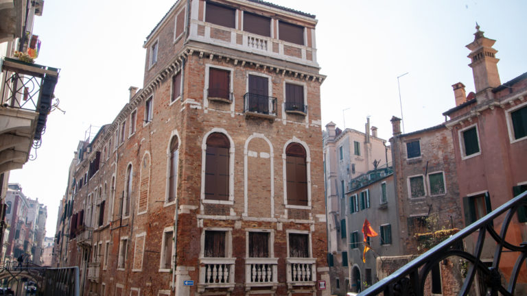 Building surrounded by canals, Venice, Italy